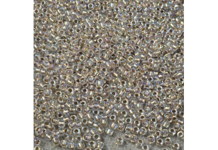 Toho 8/0 0994 Gold Lined Rainbow Crystal