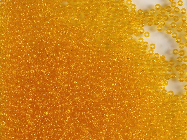 50 gr Preciosa 10/0 19001/80060 Transparent Lt. Orange — Imaginea 1