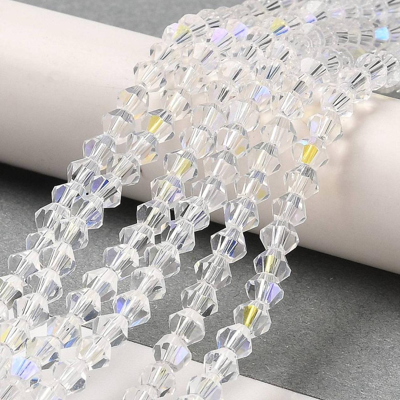 Biconice Sticla 2x3mm Crystal AB — Imaginea 2