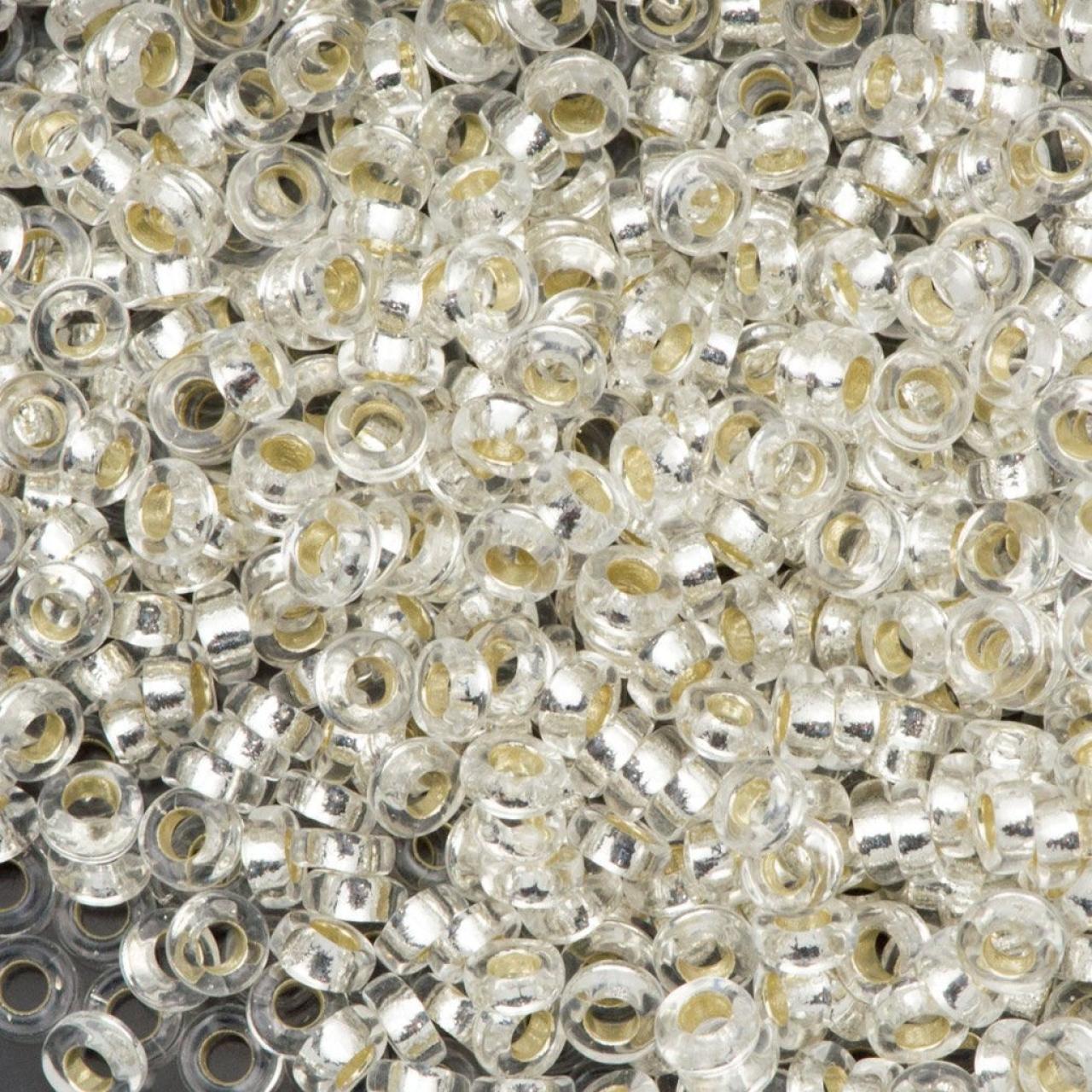 Miyuki Spacer 2,2x1 0001 Crystal Silver Lined