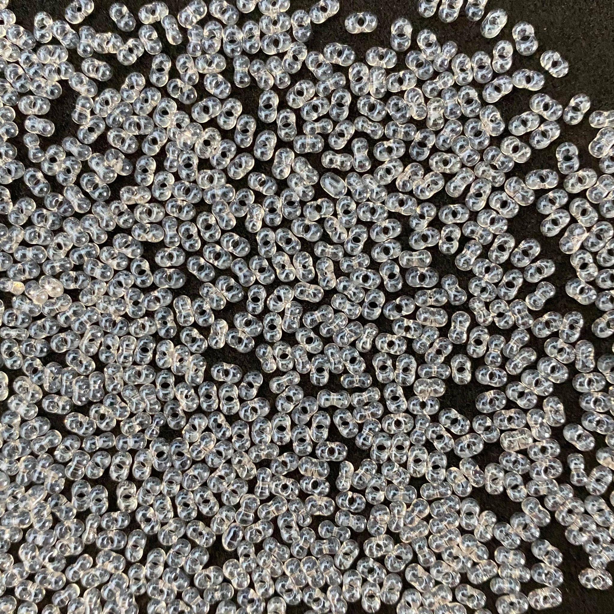 Preciosa Farfalle 2x4mm 48102 Transparent White Pearl — Imaginea 1