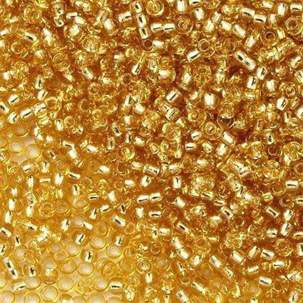 Margele Toho 11/0 0022 Silver Lined Lt Topaz