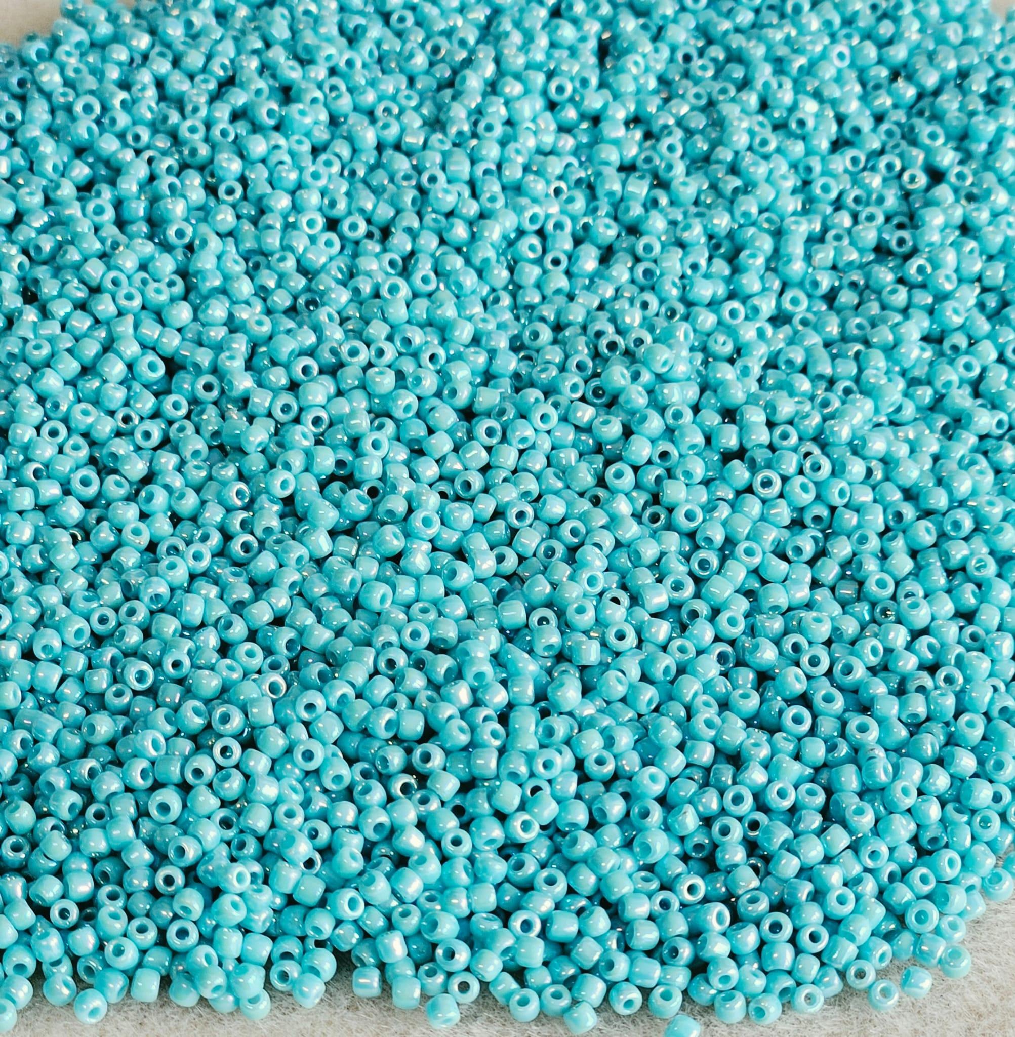 Margele Toho 11/0 0413 Opaque Rainbow Turquoise — Imaginea 1