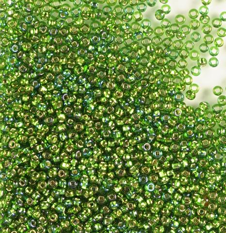 50gr Preciosa 10/0 19001/57129 Transp Green Silver Lined Rainbow — Imaginea 1