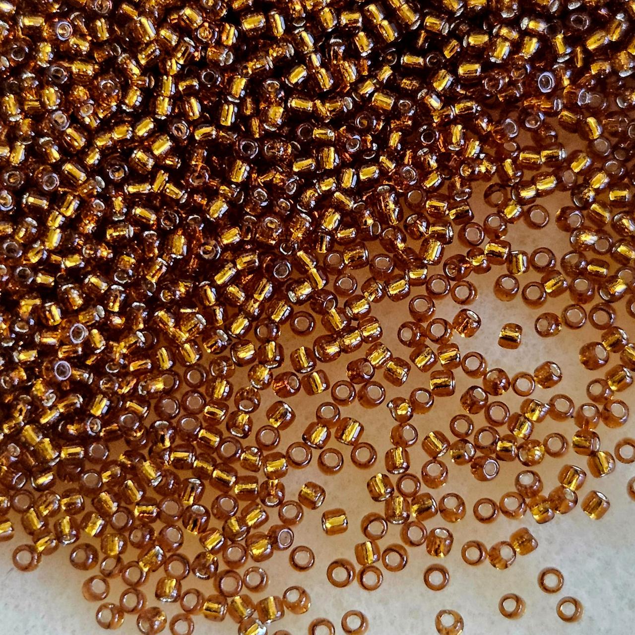 Margele Toho 11/0 0034 Silver Lined Smoked Topaz